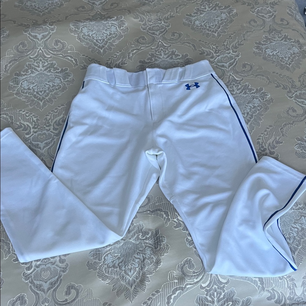 Under Armour Man’s baseball pants with Blue Trim. Never worn, but  tags removed.